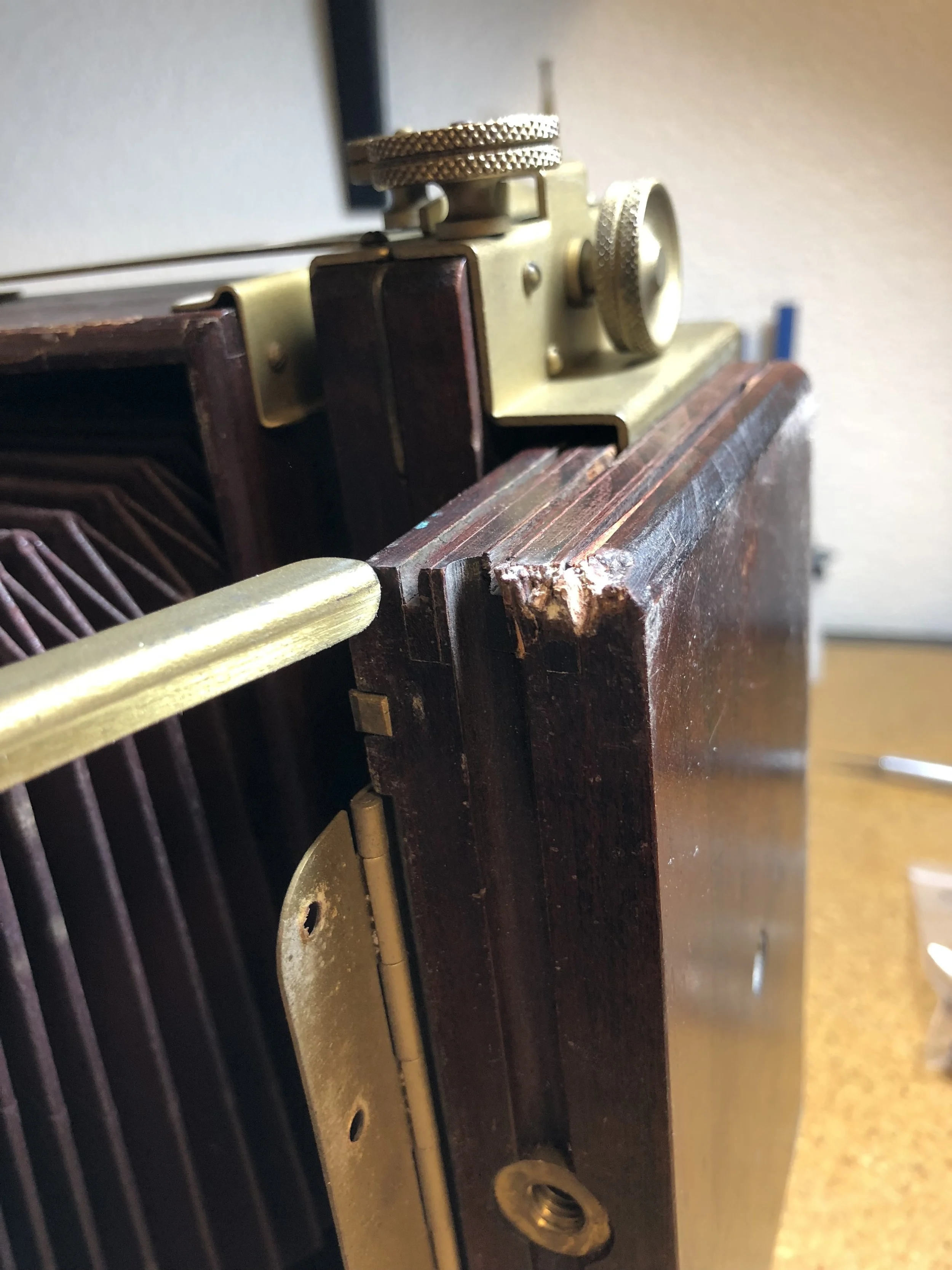  I’m pretty sure this was where the camera landed. The grooves for the rails of the two standards got pretty bashed in. 