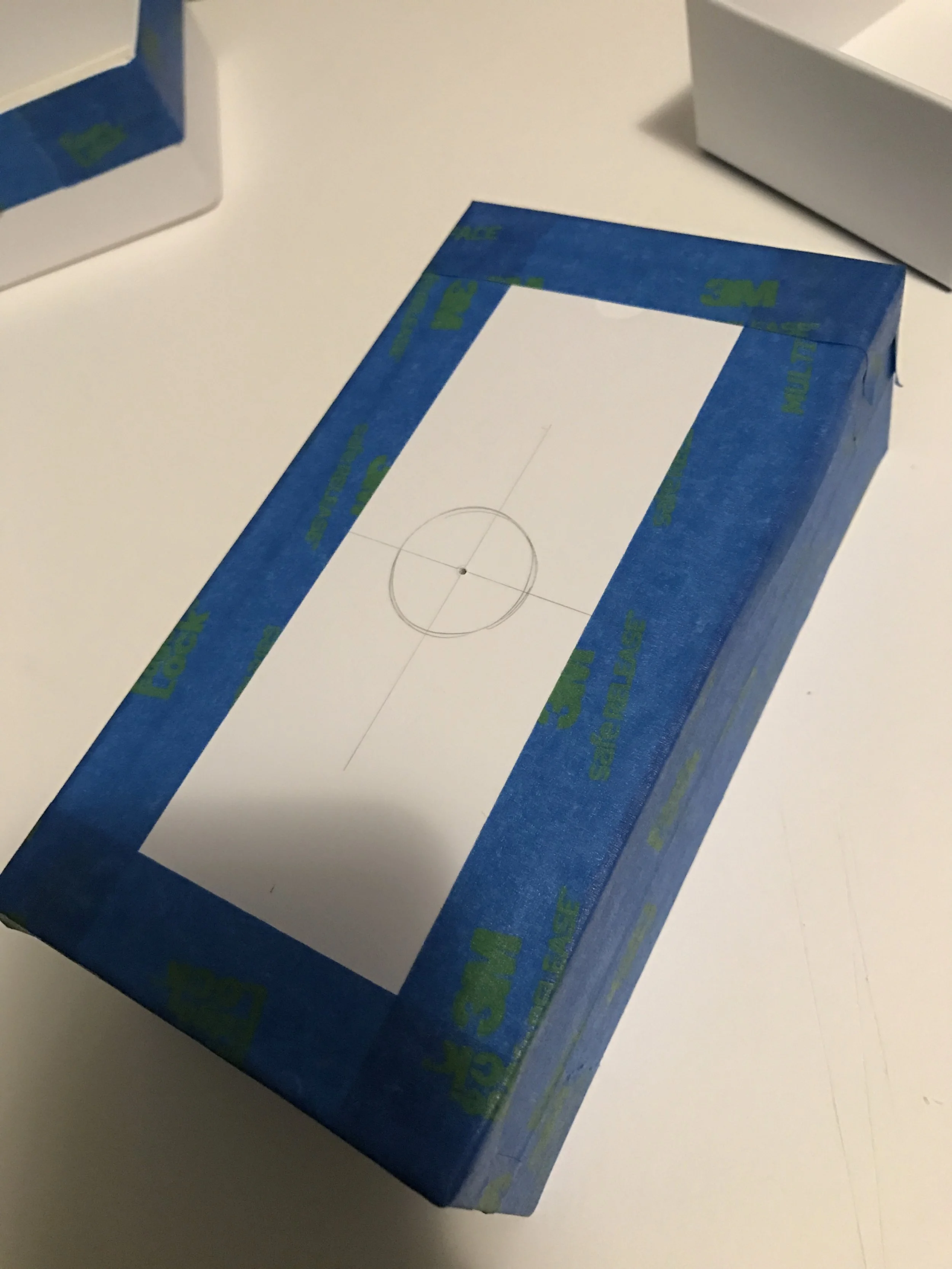  Center located and marked for opening to be cut out, exterior of box masked for painting the inside 